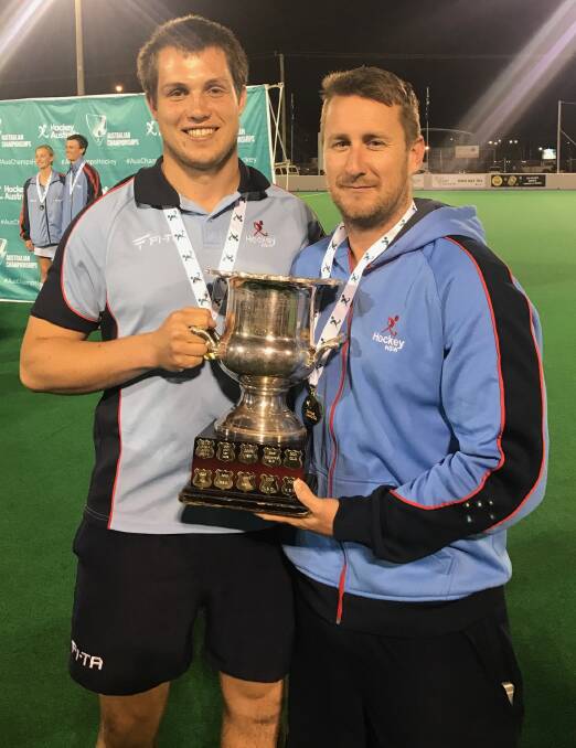WINNERS: Bathurst duo Riley Hanrahan and Jaden Ekert with the Australian Country Championships trophy they won in Townsville on Saturday.