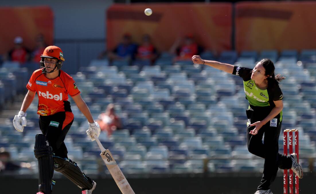 SEND IT DOWN: Lisa Griffith puts plenty of effort into this delivery in Monday's Women's Big Bash League match against the Perth Scorchers. Photo: AAP
