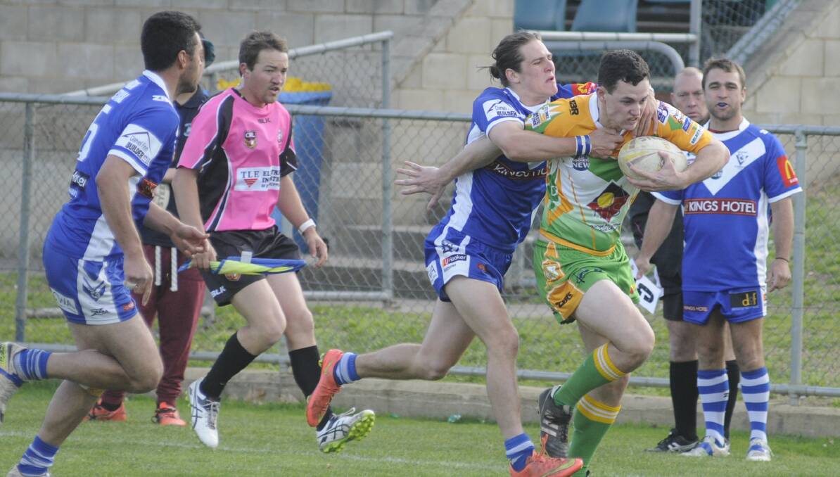 DENIED: St Pat's winger Bailey Waldron halts CYMS rival Todd Murphy in Sunday's final round match. Photo:CHRIS SEABROOK 08211cpats2