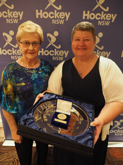 RECOGNISED: Mavis Randle (left) presented Bathurst's Ange Brown with her Hockey NSW 2017 Official of The Year Award. Photo: JESS MORAN, HOCKEY NSW