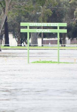 GIRT BY SEA: The Forbes Platypi's rugby ground, Grinsted Oval, is completely overwhelmed by floodwaters after record rainfall this winter. 