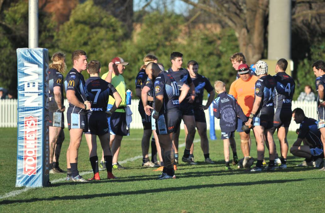 WAITING GAME: The two blues did a lot of standing behind the goal posts during Saturday's loss, with CYMS scoring 16 tries. Photo: JUDE KEOGH