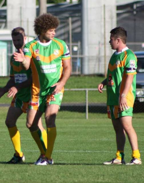 THIS WAY: Matt King helping out CYMS hooker Sam Hill in 2014. 