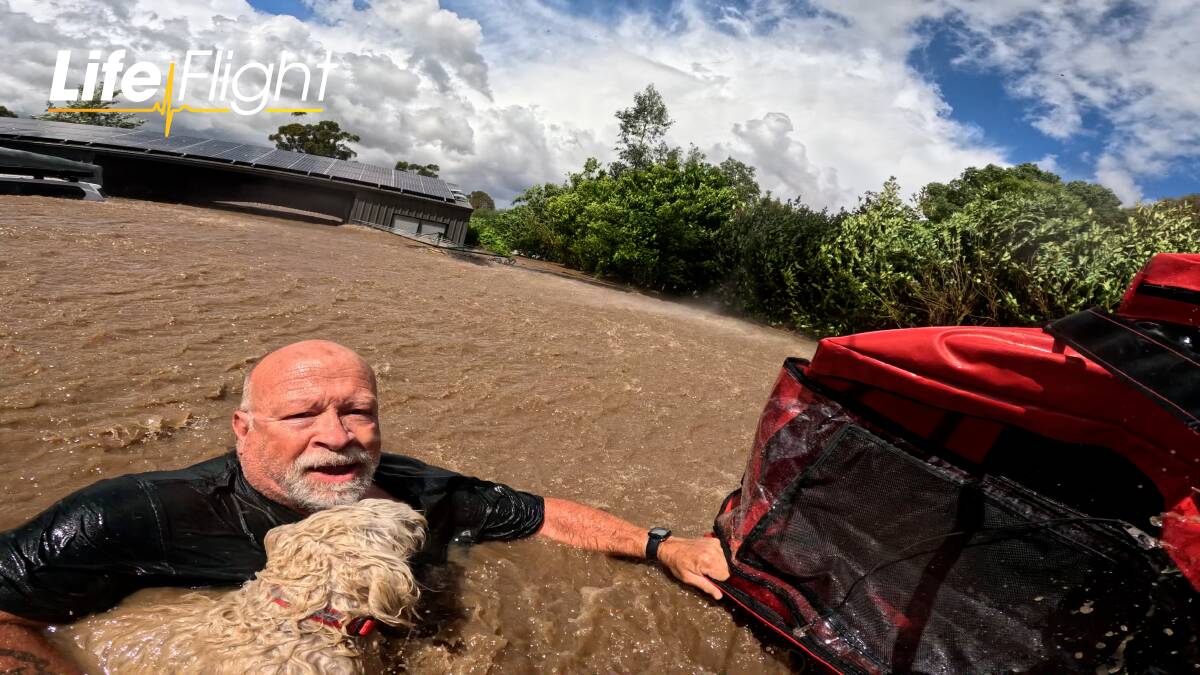 Brian Smith is rescued from floodwater in Eugowra in November, 2022. Picture by LifeFlight