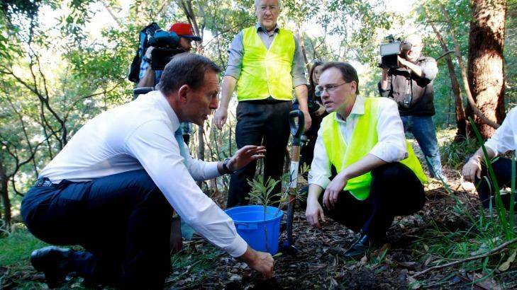 The Green Army was a signature environment policy when Tony Abbott (left) was prime minister, and Greg Hunt (right) his environment minister. Photo: Edwina Pickles