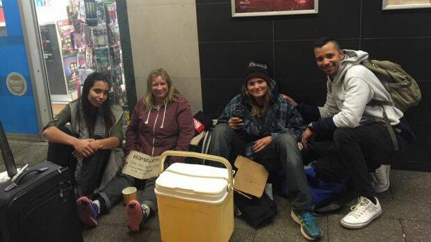 Siham and Mirwan Carollisen (far right and far left) helping the homeless in Northbridge earlier this year.  Photo: Facebook / Brothers & Sisters PERTH