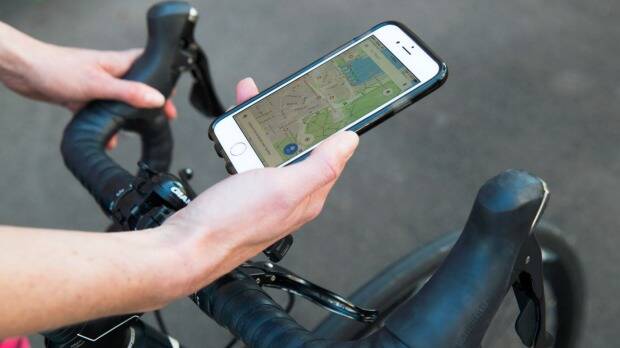 There are specific rules for mobile phone use when cycling. Photo: Janie Barrett