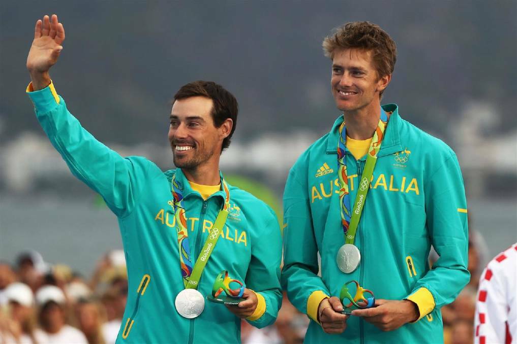 Mathew Belcher of Australia and Will Ryan of Australia celebrate winning the silver medal in the Men's 470 class at the Marina da Gloria on Day 13 of the 2016 Rio Olympic Games on August 18, 2016 in Rio de Janeiro, Brazil. Photo: Matthias Hangst/Getty Images