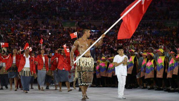 Pita Nikolas Aufatofua of Tonga carries the flag during the Opening Ceremony of the Rio 2016 Olympic Games at Maracana Stadium on August 5, 2016 in Rio de Janeiro, Brazil.  Photo: Getty

