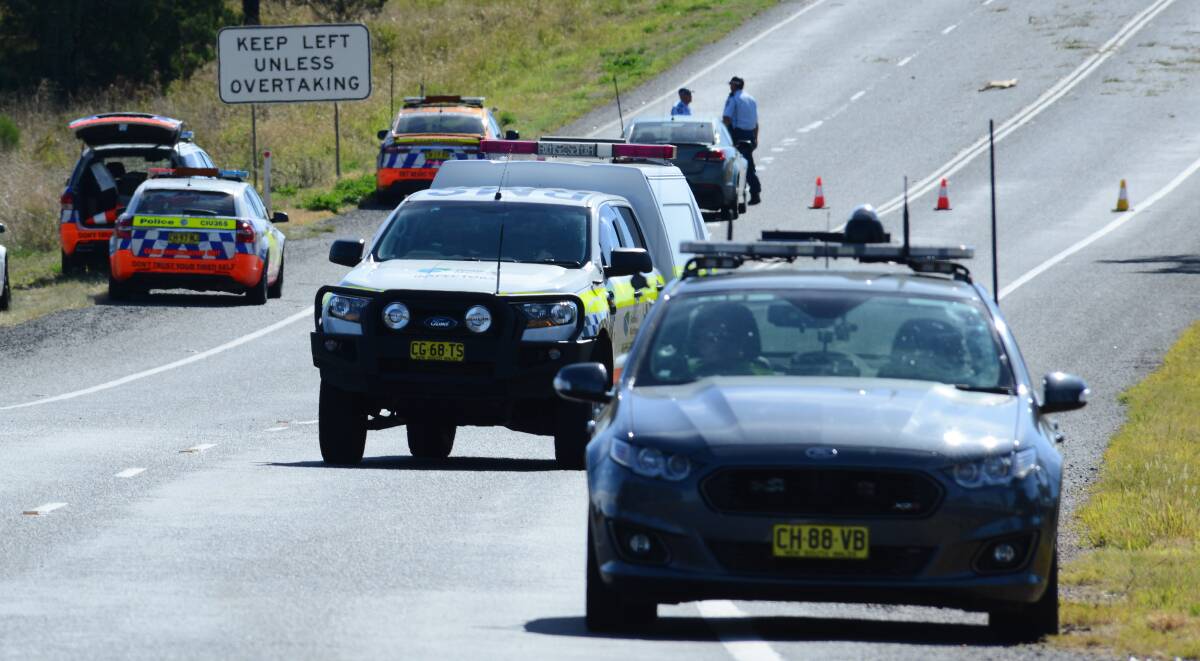 TRAGEDY: Police at the scene of a crash between a four-wheel drive and a truck north of Dubbo back in May, which claimed the lives of two children. Photo: BELINDA SOOLE