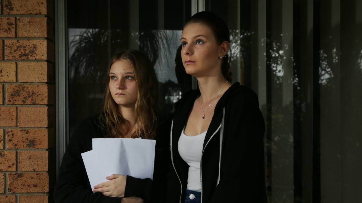 SEARCHING FOR ANSWERS: Belmont High School student Codie Bone and her sister Kaila. Codie's school report was sent to the wrong family. Picture: Simone De Peak 
