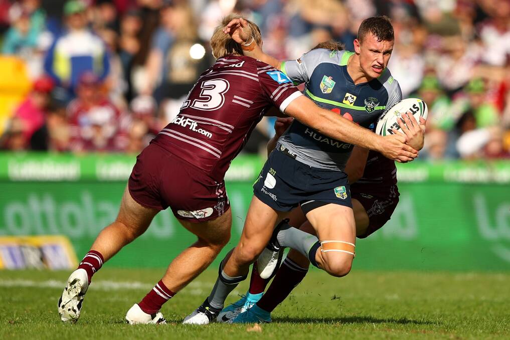 COMING HOME: Jack Wighton gets dragged down against Manly last week. He's dead keen to return to the western region for Saturday's clash against Penrith. Photo: GETTY IMAGES