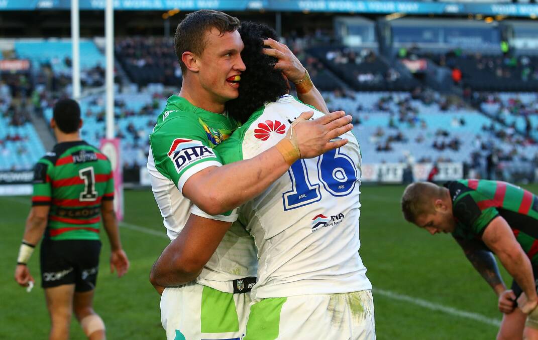 SECOND THE GOAL: Orange's Jack Wighton celebrates a try against South Sydney with Sia Soliola, his Raiders side is two wins away from finishing second for the first time since 1995. Photo: GETTY IMAGES