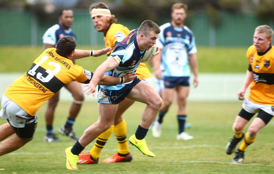 POSITIVE TWO BLUES: Jedd Kennedy finds a gap against Oberon. He was one of Hawks' best against the Tigers on Saturday. Photo: PHIL BLATCH 0510pbhawks19