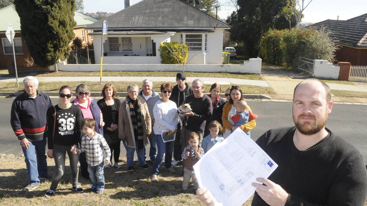 UNITED VOICE: Keppel Street resident Jon Clipsham (front) and his neighbours who opposed a planned development near their homes. Photo: CHRIS SEABROOK 081317cprotst