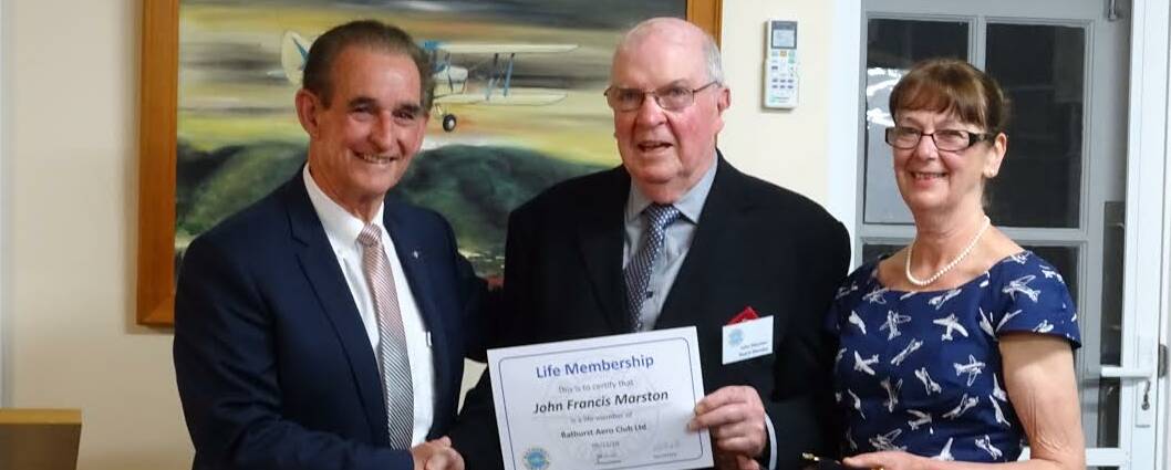 LIFE MEMBER: John Nicoll and Leslie Marston congratulate John Marston (centre) on his life membership.
