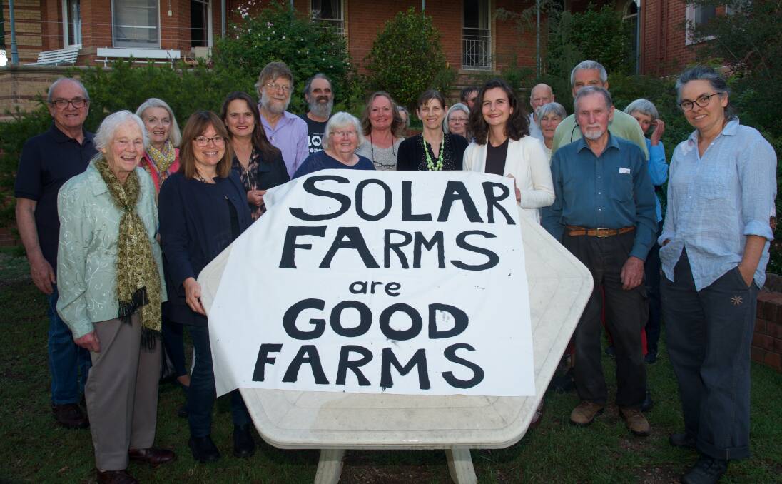 HERE COMES THE SUN: Supporters of renewable energy gathered at Rahamim for the Bathurst Community Climate Action Network annual general meeting and Rahamim’s Green Drinks last Friday. Photo: STEVE WOODHALL