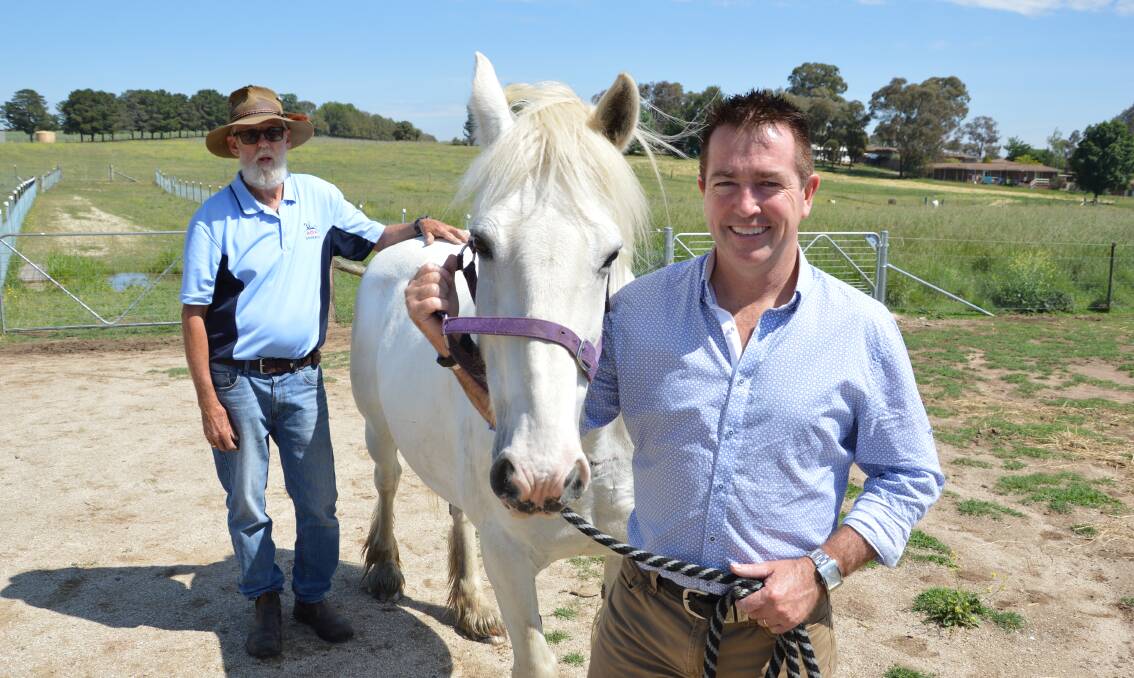 FENCE ME IN: Riding for the Disabled Bathurst president Kevin Stapleton and Member for Bathurst Paul Toole at the RDA facility, which now has new fencing thanks to funding from the NSW Government.