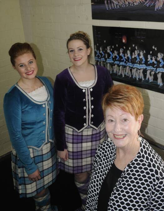 GREAT SCOT: OzScot Australia Highland Dance Group director Cheryl Roach with dancers Neve Moore and Esther Dean. Photo: CHRIS SEABROOK 070416croach1