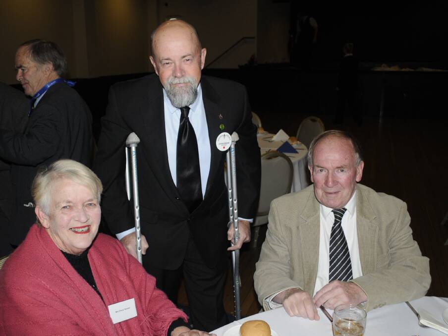 NIGHT OUT: Cheryl and David Veness (seated ) were joined by Peter Dowling. 062516clegacy3