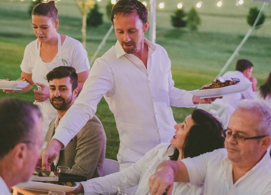 WHITE OUT: Dinner is served at Mayfield Garden's first White Party in 2017. The party is returning to Mayfield next weekend. Photo: SUPPLIED