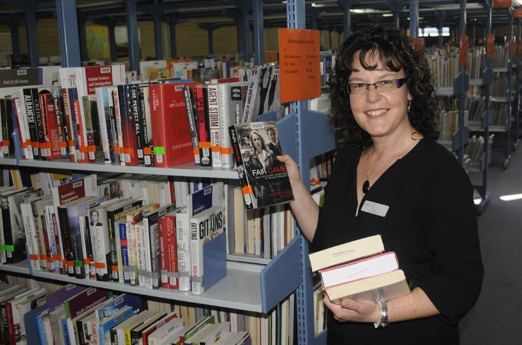 BOOK IT IN: Bathurst Library office co-ordinator is looking forward to a $200,000 refurbishment in December. Photo:CHRIS SEABROOK 101817creno1a