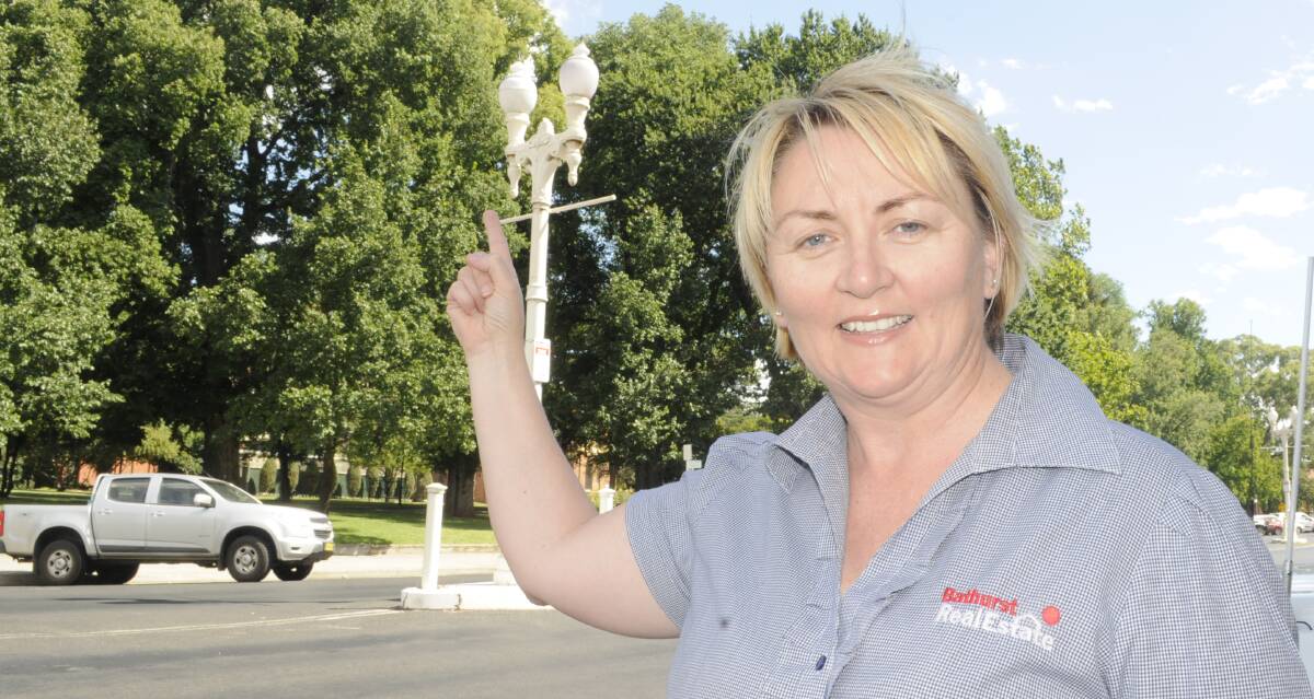 CHEER UP: Bathurst Business Chamber president Stacey Whittaker says the CBD's lamp standards would be perfect for Christmas decorations. Photo: CHRIS SEABROOK