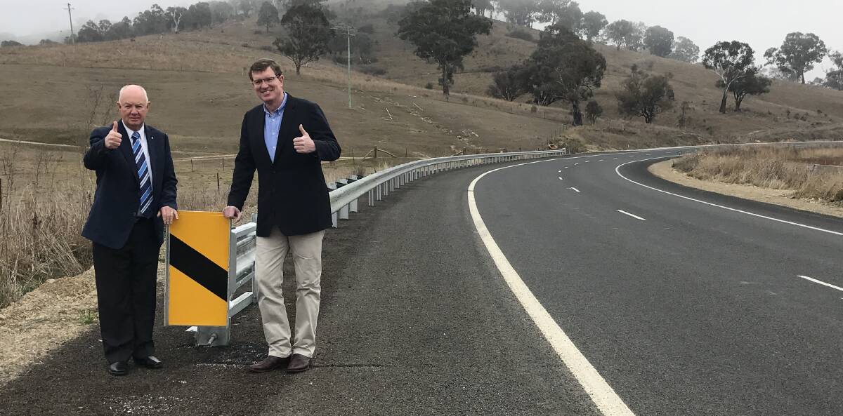 THUMBS UP: Bathurst mayor Graeme Hanger and Calare MP Andrew Gee inspect the Sofala Road upgrades. Photo: CONTRIBUTED