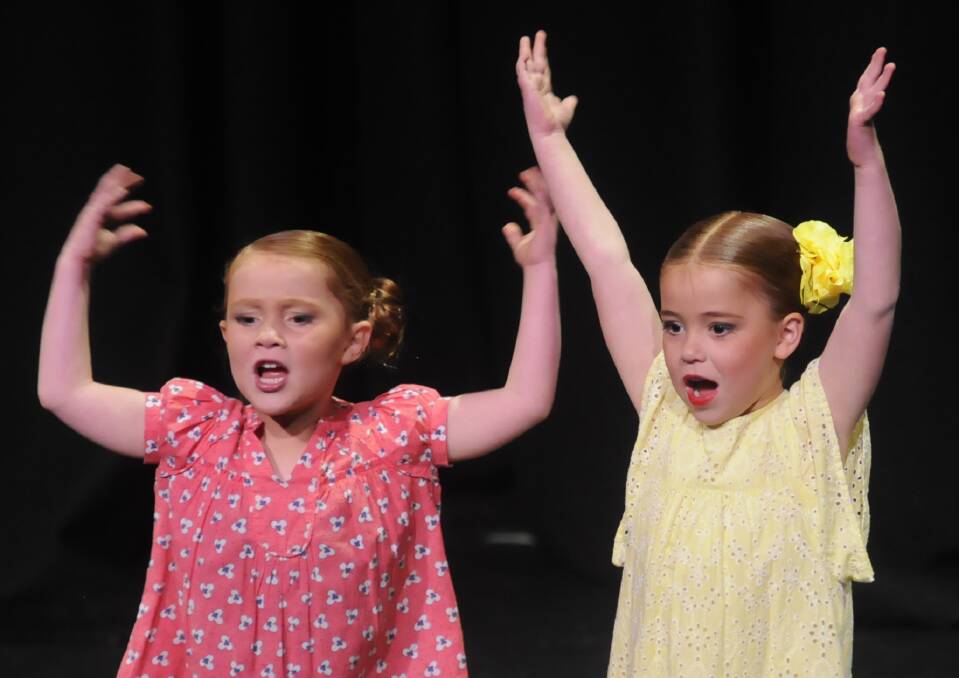 UP IN ARMS: Harper Cain and Lola Cain took out the Poems For Two section at the Bathurst Eisteddfod on Sunday. 082816ceist4a