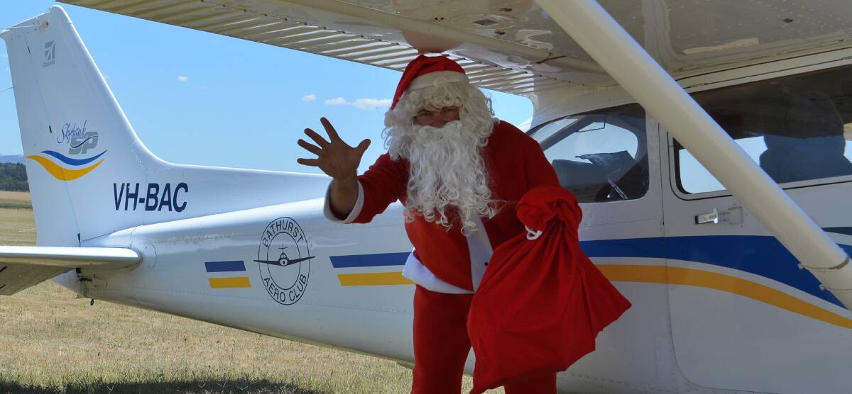 FLYING VISIT: Santa Claus will be dropping in to the Bathurst Aero Club clubhouse on Saturday morning to celebrate another successful year for the club and to hand out gifts to the children of members. 