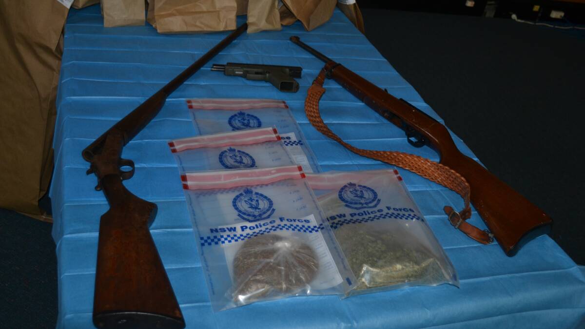 The Chifley Target Action Group has seized guns and drugs following the execution of two search warrants on Thursday