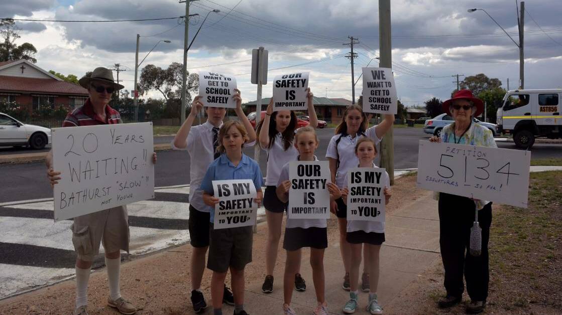 WHAT ABOUT US: Campaigners at the intersection of Lambert, Mitre and Suttor streets in November last year.