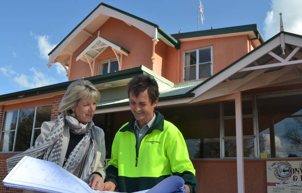 NINE HOMES: Jo and Robert Barlow go over their plans for a redevelopment of the Bathurst Convention and Function Centre site. Photo: MURRAY NICHOLLS 081916mnbarlow1