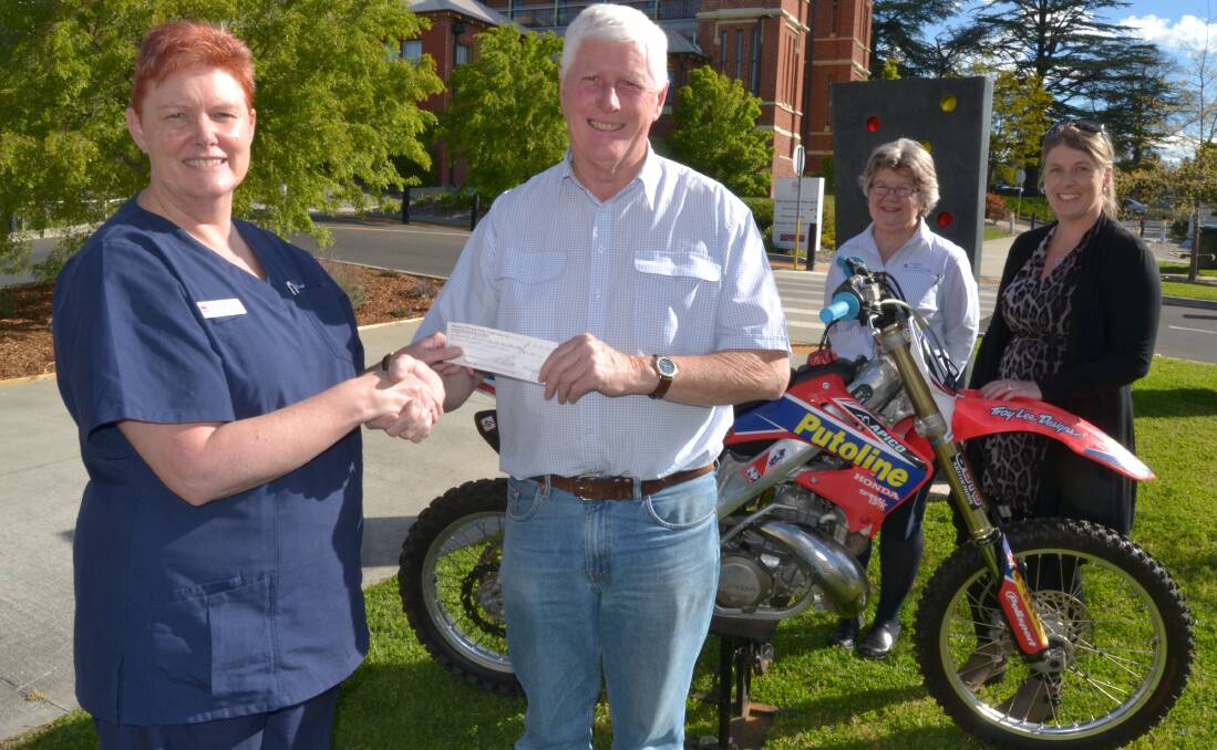 IN MEMORY: Bathurst Hospital ICU's Anne Morrison, Panorama Motorcycle Club's Bruce Morgan, acting director of nursing and midwifery Patsy Sullivan and Susan Hurt.
