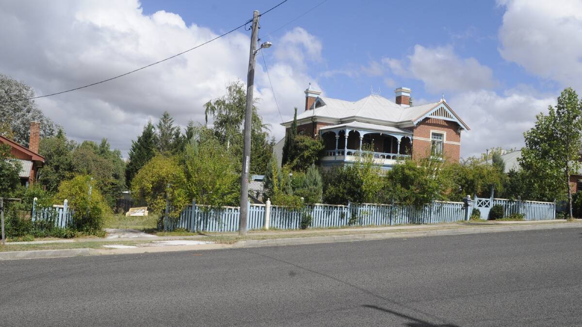 NARROW VICTORY: The nine metre-wide block stands between two homes that date back more than a century.