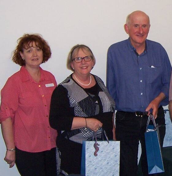 IN THE BAG: Convenor Karin le Roux with winning team members Sue Stacey and Jim Driscoll. 