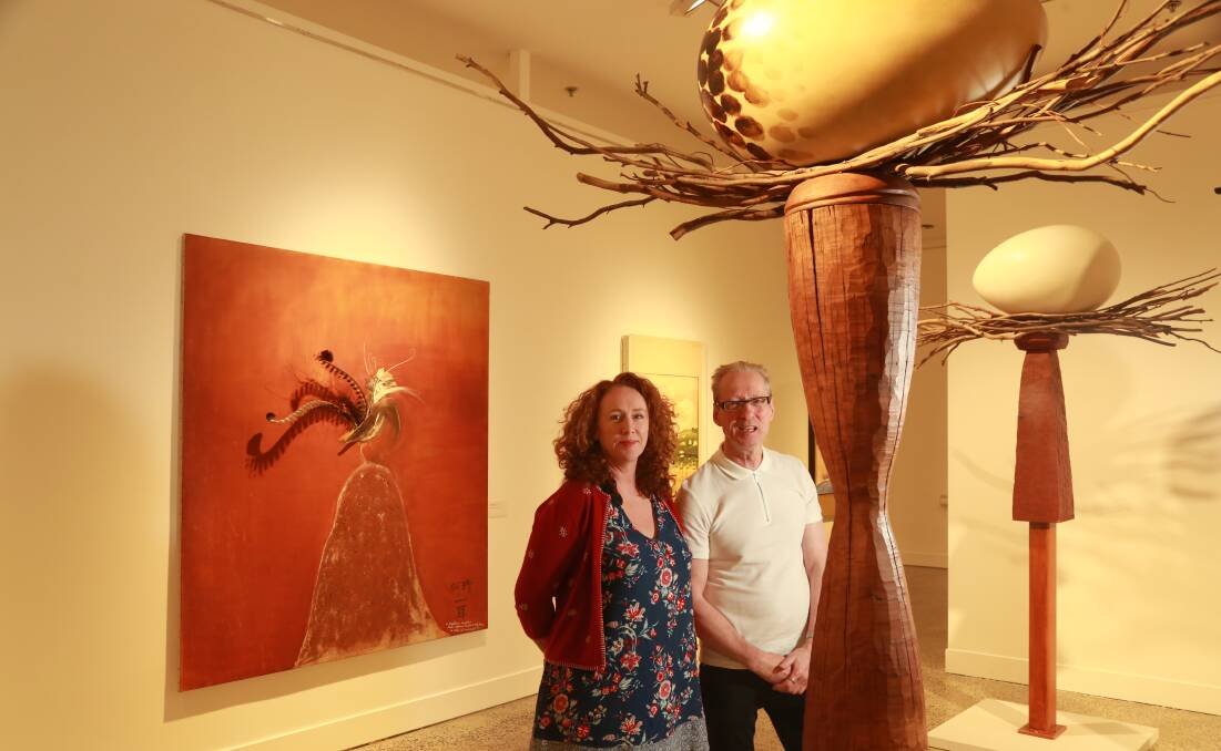 WONDER OF WHITELEY: Bathurst Regional Art Gallery curator Sarah Gurich and director Richard Perram with works now on show as part of Brett Whiteley: West of the Divide. Photo: PHIL BLATCH 120716pbbrett1