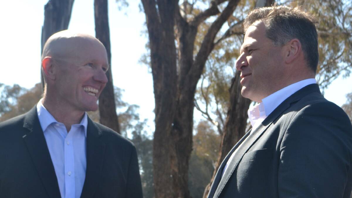 BUOYED: Shooters, Fishers and Farmers Party candidate for Bathurst Brenden May with Orange MP Phil Donato.