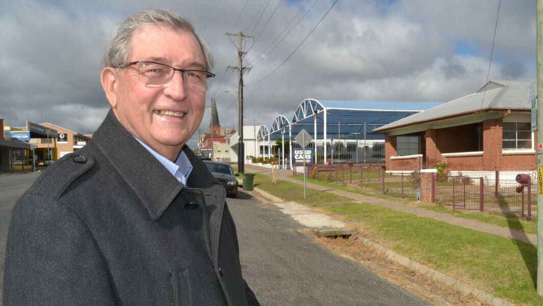 CBD SITE: Businessman Bruce Bolam near the old Clancy Motors site on Howick Street. The site has been identified as suitable for a future shopping centre.