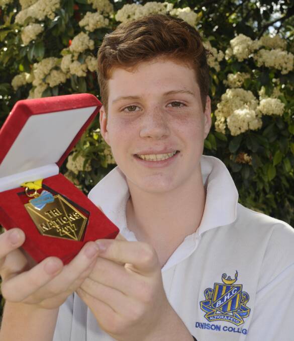 WINNERS ARE GRINNERS: Jonathan Limbrick was the winner in an international maths competition. Photo: CHRIS SEABROOK