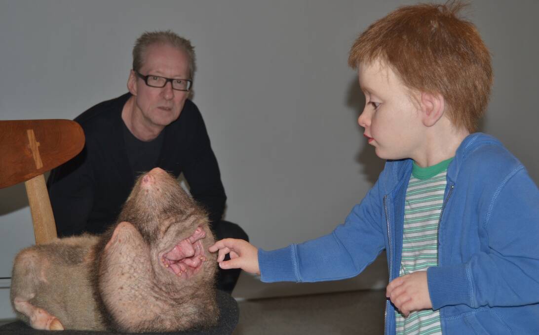 GROTESQUELY BEAUTIFUL: Bathurst Regional Art Gallery director Richard Perram looks over Doubting Thomas by Patricia Piccinini, one of the works in the Beyond Belief exhibition.