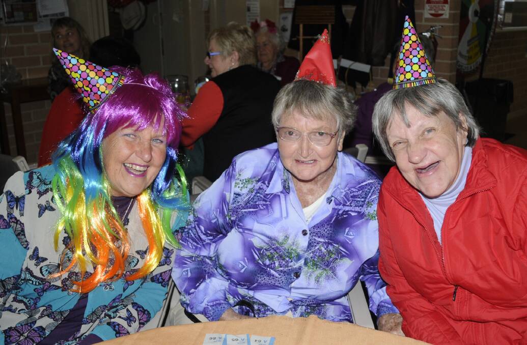 HAT'S THE WAY: Nicky Daniels, Shirley Engler and Christine Lynne all got into the party spirit. 081716cseymr2