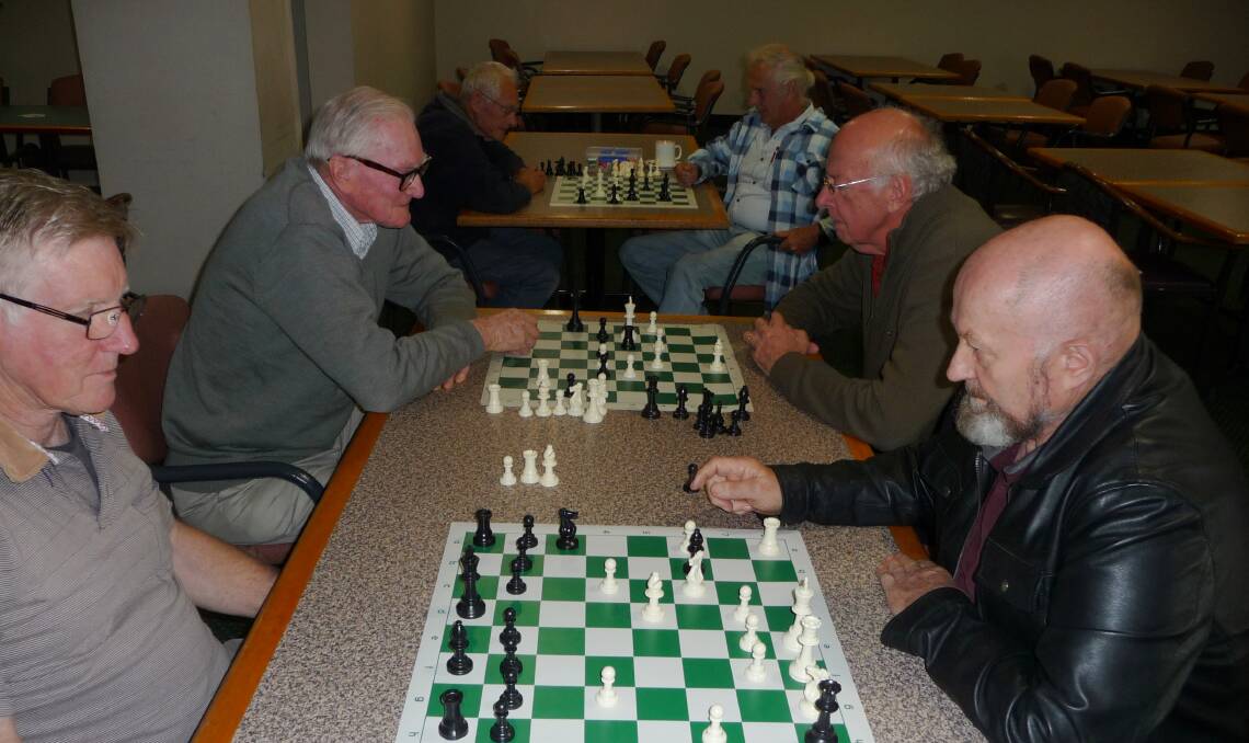 SERIOUS FUN: University of the Third Age members are deep in concentration during their weekly chess session.