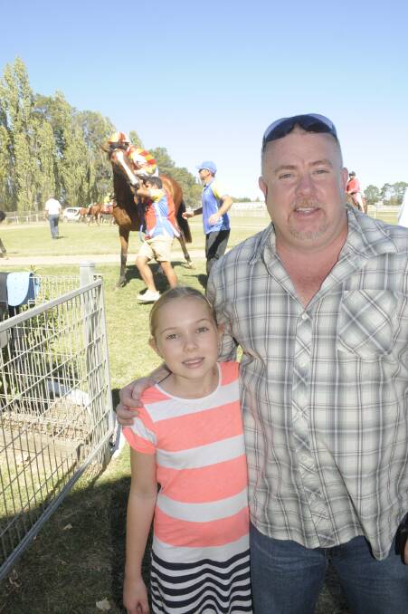 GREAT FAMILY DAY: Ross Houghton with his daughter, Holly(10) from Sydney. 021317cturf10