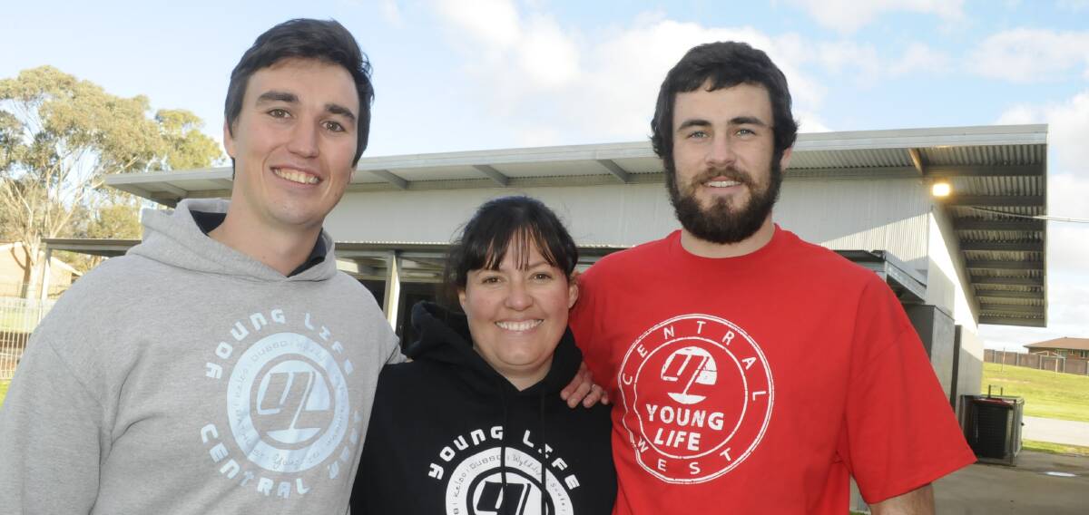 MAKING A CHANGE: Young Life volunteers Alex Cuttiford Ansia Klavins and John Ryan. Photo: CHRIS SEABROOK 091916cyunglife
