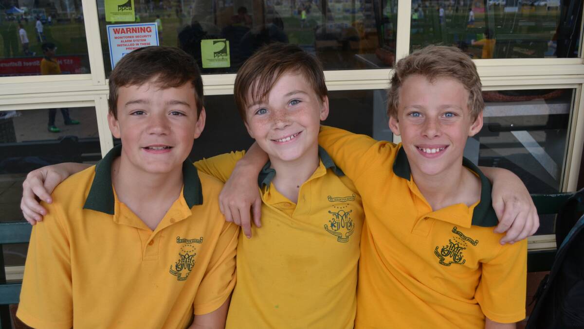 FUN TIMES: Regan Stait, David Wardle and Billy Wilson had a great day at the Gala Soccer Day.