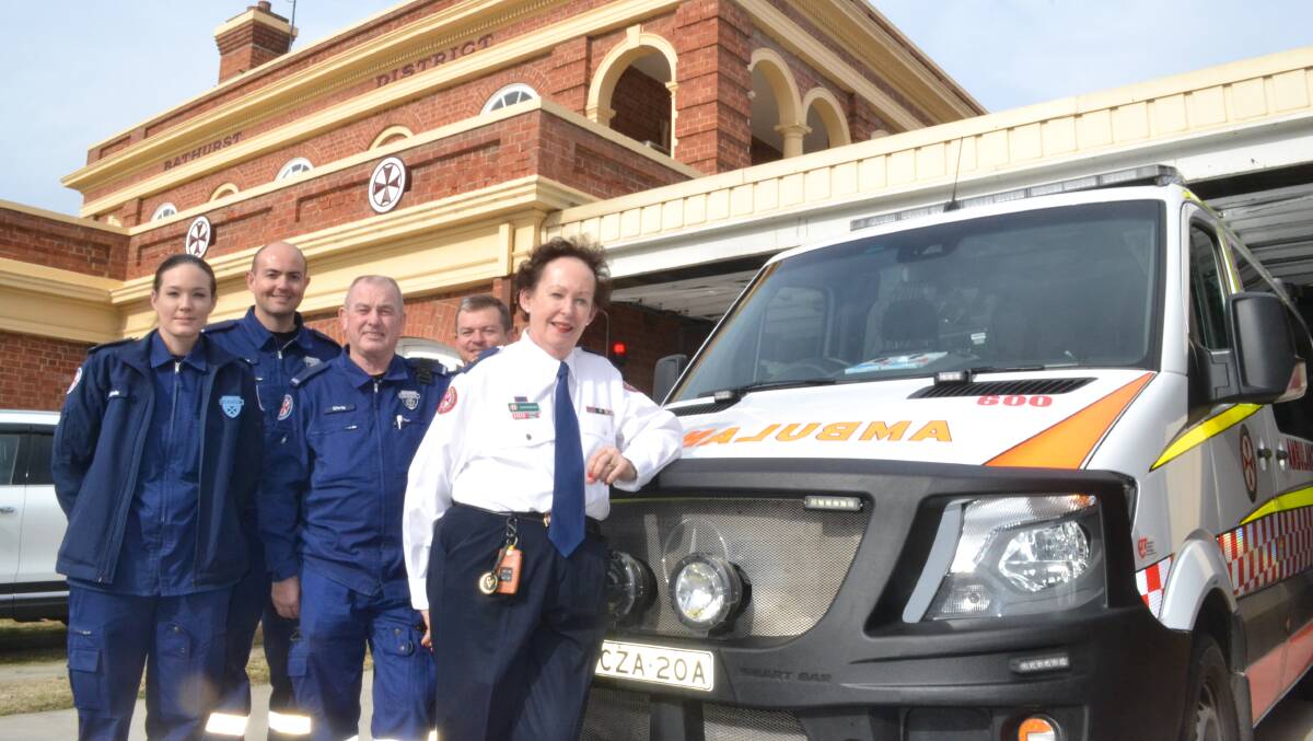 STELLAR CAREER: Supt Susan Webster, standing in front of Bathurst Ambulance Station on her last day, surrounded by her colleagues.
