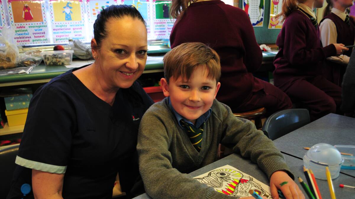 FAMILY DAY: Seth Mills with his mum, Sophie Travers, at the Assumption School's 65th celebrations.