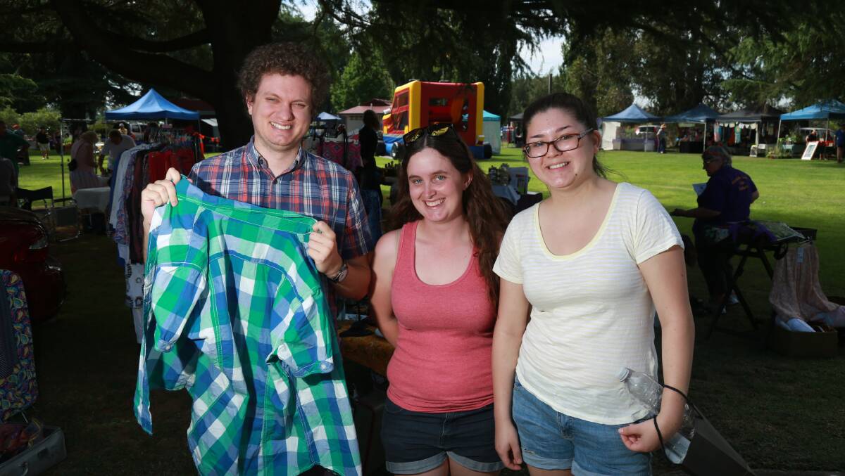 HAVING A LOOK: Ben Melbourne, Jessica Ryan and Hannah Richardson at the Riverside Markets, Berry Park.