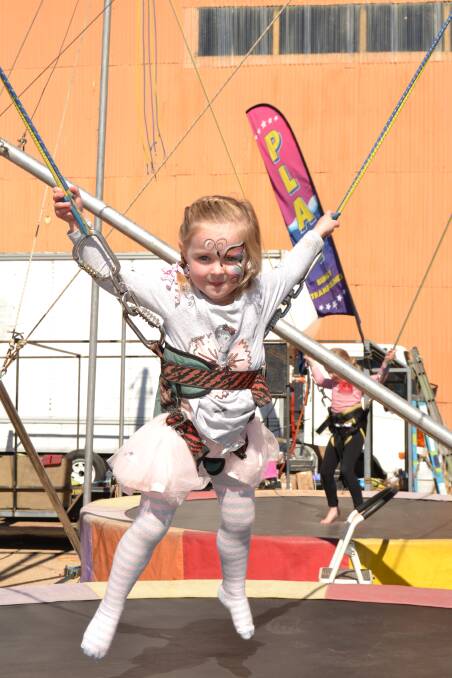 FLYING HIGH: Sienna Harvey enjoying the trampolines at the show on Sunday.